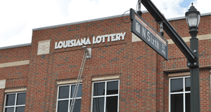 External shot of a two-story brick 幸运168®飞艇开奖预测网-Louisiana全国统一历史记录预测_在线查询开奖最新数据 building on a city street.