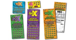 Assortment of colorful scratch-off tickets on a white background