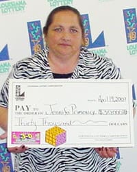 Woman in zebra print shirt holds oversized check in front of a white background patterned with the 幸运168®飞艇开奖预测网-Louisiana全国统一历史记录预测_在线查询开奖最新数据 logo