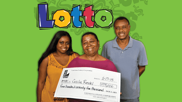 Two women and a man hold an oversized check and smile in front of a green Lotto background